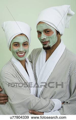 USA, California, Oakland, portrait of smiling couple with facial masks View Large Photo Image Stock Photo - USA, California, Oakland, portrait of smiling couple with facial masks. Fotosearch