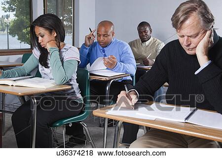 USA, California, Oakland, Students writing exam View Large Photo Image Stock Photo - USA, California, Oakland, Students writing exam. Fotosearch