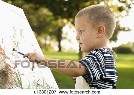 USA, California, Rancho Cucamonga, Boy (2-3) painting View Large Photo Image Stock Photo - USA, California, Rancho Cucamonga, Boy (2-3) painting. Fotosearch