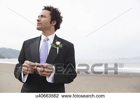 USA, California, San Francisco, Baker Beach, groom on beach View Large Photo Image Stock Image - USA, California, San Francisco, Baker Beach, groom on beach. Fotosearch
