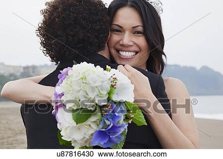USA, California, San Francisco, Baker Beach, bride and groom embracing on beach View Large Photo Image Stock Image - USA, California, San Francisco, Baker Beach, bride and groom embracing on beach. Fotosearch