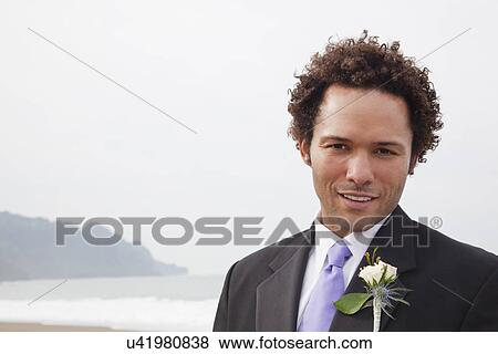 USA, California, San Francisco, Baker Beach, portrait of groom on beach View Large Photo Image Stock Photo - USA, California, San Francisco, Baker Beach, portrait of groom on beach. Fotosearch