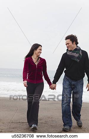 USA, California, San Francisco, Baker Beach, couple walking on beach View Large Photo Image Stock Photo - USA, California, San Francisco, Baker Beach, couple walking on beach. Fotosearch