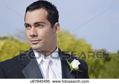 USA, California, San Francisco, groom wearing suit outdoors View Large Photo Image Stock Photography - USA, California, San Francisco, groom wearing suit outdoors. Fotosearch
