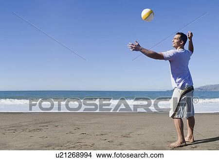 USA, California, San Francisco, man playing volley ball on Baker Beach View Large Photo Image Picture - USA, California, San Francisco, man playing volley ball on Baker Beach. Fotosearch
