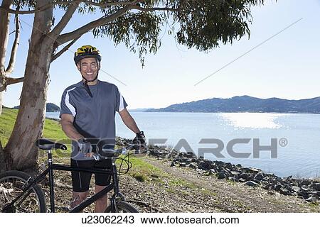 USA, California, Tiburon, Cyclist at lakeside View Large Photo Image Stock Image - USA, California, Tiburon, Cyclist at lakeside. Fotosearch