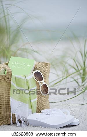 USA, Florida, St. Pete Beach, Beach bag and sandals on beach View Large Photo Image Stock Photo - USA, Florida, St. Pete Beach, Beach bag and sandals on beach. Fotosearch