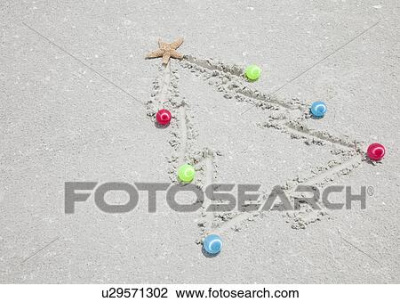 USA, Florida, St. Pete Beach, Christmas tree drawn in sand View Large Photo Image Stock Image - USA, Florida, St. Pete Beach, Christmas tree drawn in sand. Fotosearch