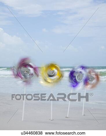 USA, Florida, St. Pete Beach, Row of pinwheels on beach View Large Photo Image Stock Photo - USA, Florida, St. Pete Beach, Row of pinwheels on beach. Fotosearch