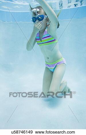USA Florida, St. Pete Beach, Underwater shot of girl (8-9) diving View Large Photo Image Stock Photo - USA Florida, St. Pete Beach, Underwater shot of girl (8-9) diving. Fotosearch