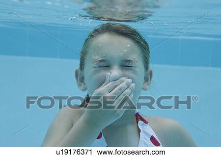 USA, Florida, St. Petersburg, Girl (10-11) diving in swimming pool View Large Photo Image Stock Image - USA, Florida, St. Petersburg, Girl (10-11) diving in swimming pool. Fotosearch