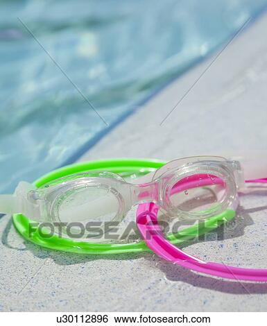 USA, Florida, St. Petersburg, goggles and rings on poolside View Large Photo Image Stock Photograph - USA, Florida, St. Petersburg, goggles and rings on poolside. Fotosearch