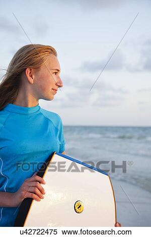 USA, Florida, St. Petersburg, portrait of girl (12-13) looking at view View Large Photo Image Stock Photography - USA, Florida, St. Petersburg, portrait of girl (12-13) looking at view. Fotosearch