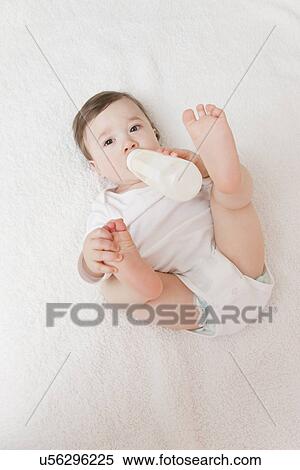 USA, Illinois, Metamora, baby boy (12-17 months) drinking milk from bottle View Large Photo Image Stock Photography - USA, Illinois, Metamora, baby boy (12-17 months) drinking milk from bottle. Fotosearch