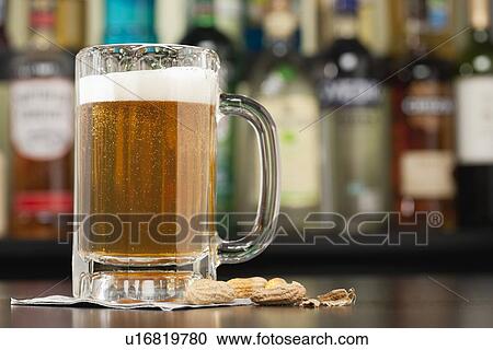 USA, Illinois, Metamora, Beer in beer mug View Large Photo Image Stock Image - USA, Illinois, Metamora, Beer in beer mug. Fotosearch
