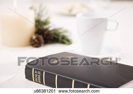 USA, Illinois, Metamora, Bible by cup on table View Large Photo Image Stock Image - USA, Illinois, Metamora, Bible by cup on table. Fotosearch