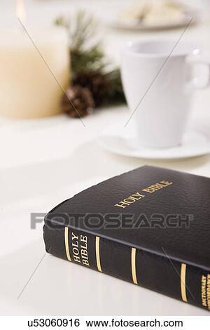 USA, Illinois, Metamora, Bible by cup on table View Large Photo Image Stock Photograph - USA, Illinois, Metamora, Bible by cup on table. Fotosearch