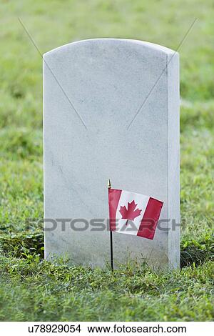 USA, Illinois, Metamora, Canadian flag on cemetery View Large Photo Image Picture - USA, Illinois, Metamora, Canadian flag on cemetery. Fotosearch