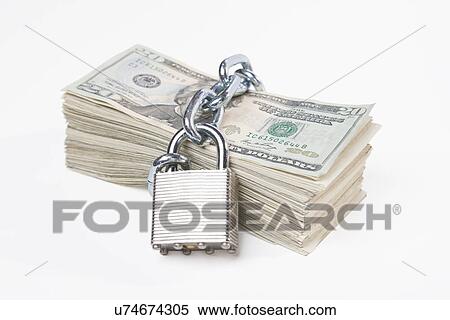 USA, Illinois, Metamora, Chained up stack of US money View Large Photo Image Stock Photography - USA, Illinois, Metamora, Chained up stack of US money. Fotosearch