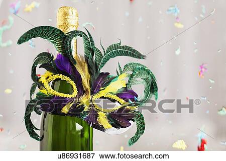 USA, Illinois, Metamora, Champagne bottle with feather decoration View Large Photo Image Stock Photo - USA, Illinois, Metamora, Champagne bottle with feather decoration. Fotosearch