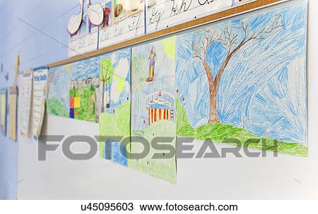 Stock Image - USA, Illinois, Metamora, Childrens drawings on whiteboard. Fotosearch