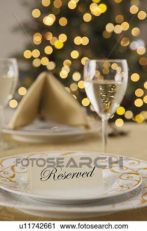 Stock Image - USA, Illinois, Metamora, Christmas table. Fotosearch