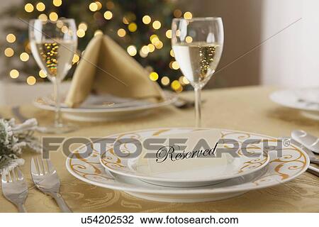 Stock Image - USA, Illinois, Metamora, Christmas table. Fotosearch
