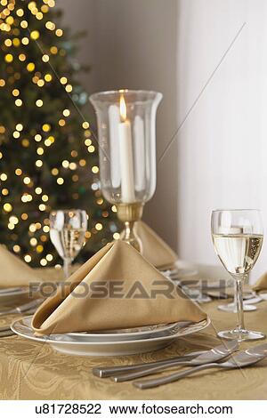 Stock Image - USA, Illinois, Metamora, Christmas table. Fotosearch