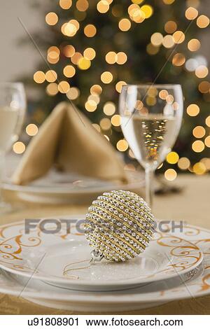 Stock Image - USA, Illinois, Metamora, Christmas table. Fotosearch