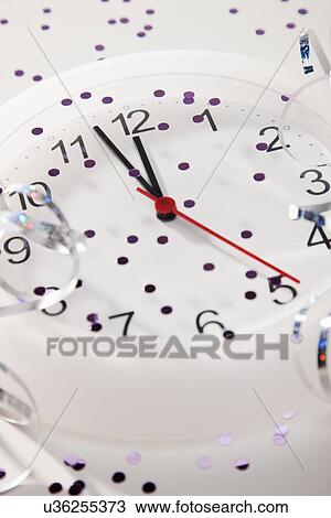 USA, Illinois, Metamora, Clock after New year celebrations View Large Photo Image Stock Image - USA, Illinois, Metamora, Clock after New year celebrations. Fotosearch