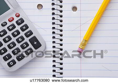 USA, Illinois, Metamora, Close-up of pencil and calculator on notebook View Large Photo Image Stock Image - USA, Illinois, Metamora, Close-up of pencil and calculator on notebook. Fotosearch