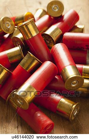 Stock Image - USA, Illinois, Metamora, Close-up of bullets on table. Fotosearch