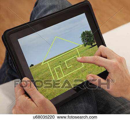 USA, Illinois, Metamora, Close-up of woman drawing house on digital tablet View Large Photo Image Stock Image - USA, Illinois, Metamora, Close-up of woman drawing house on digital tablet. Fotosearch