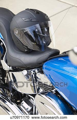 Stock Image - USA, Illinois, Metamora, Close up of safety helmet on motorcycle. Fotosearch