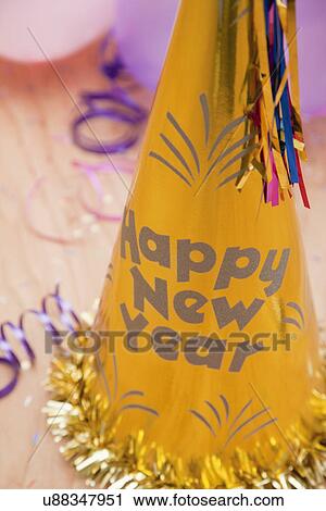 Stock Image - USA, Illinois, Metamora, close up of new year's eve party hat. Fotosearch