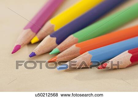 Stock Photo - USA, Illinois, Metamora, Close-up of multicolored crayons on table. Fotosearch