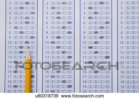 USA, Illinois, Metamora, Close-up of pencil on academic test View Large Photo Image Stock Photo - USA, Illinois, Metamora, Close-up of pencil on academic test. Fotosearch