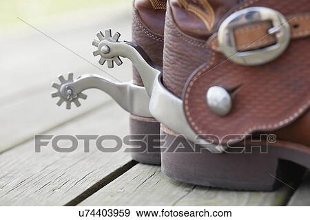 USA, Illinois, Metamora, Close-up of cowboy boots with spurs View Large Photo Image Stock Photo - USA, Illinois, Metamora, Close-up of cowboy boots with spurs. Fotosearch