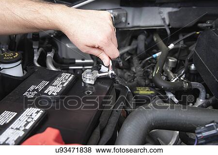 USA, Illinois, Metamora, Close-up of human hand repairing engine View Large Photo Image Stock Photo - USA, Illinois, Metamora, Close-up of human hand repairing engine. Fotosearch
