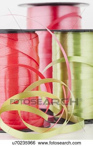 Stock Photograph - USA, Illinois, Metamora, Close up of spools of ribbon. Fotosearch