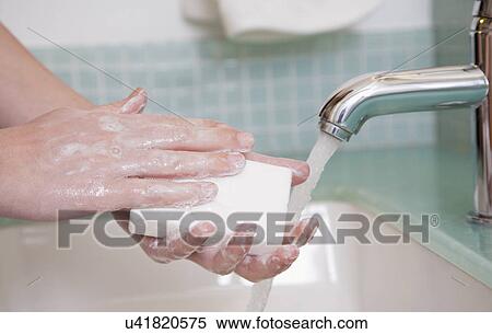 USA, Illinois, Metamora, close up of hands with soap bar View Large Photo Image Stock Photography - USA, Illinois, Metamora, close up of hands with soap bar. Fotosearch