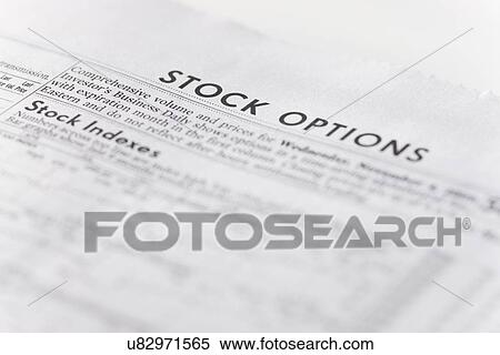 Stock Photography - USA, Illinois, Metamora, Close-up of stock quotes in newspaper. Fotosearch