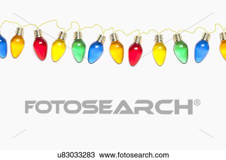 USA, Illinois, Metamora, colorful Christmas lights on white background View Large Photo Image Stock Image - USA, Illinois, Metamora, colorful Christmas lights on white background. Fotosearch