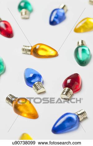 USA, Illinois, Metamora, colorful Christmas lights on white background, close-up View Large Photo Image Stock Photo - USA, Illinois, Metamora, colorful Christmas lights on white background, close-up. Fotosearch
