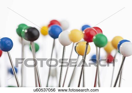 Stock Photograph - USA, Illinois, Metamora, colorful sewing pins. Fotosearch
