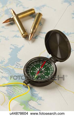 USA, Illinois, Metamora, Compass and bullets on map View Large Photo Image Picture - USA, Illinois, Metamora, Compass and bullets on map. Fotosearch