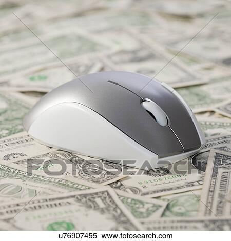 USA, Illinois, Metamora, Computer mouse on money View Large Photo Image Stock Photography - USA, Illinois, Metamora, Computer mouse on money. Fotosearch