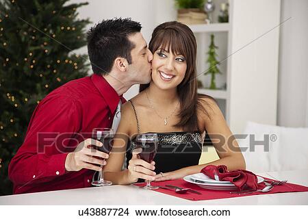 USA, Illinois, Metamora, Couple drinking wine in room View Large Photo Image Picture - USA, Illinois, Metamora, Couple drinking wine in room. Fotosearch