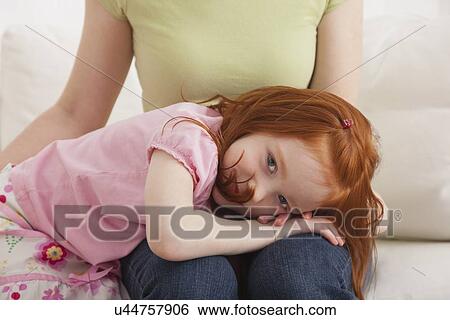 USA, Illinois, Metamora, Daughter (4-5) leaning on mother's knees View Large Photo Image Stock Photograph - USA, Illinois, Metamora, Daughter (4-5) leaning on mother's knees. Fotosearch