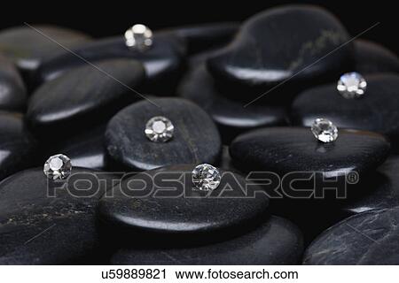 Stock Image - USA, Illinois, Metamora, Diamonds on gem stones. Fotosearch